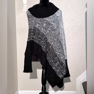 Black and white sweater poncho with arms
